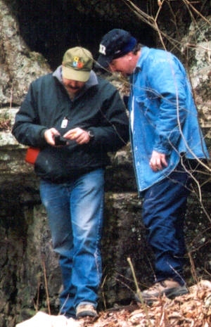 2002 - Geocacher 'barramus' inspecting the GPS receiver I found in a nearby rock crevice. Turns out a caver left it there while he went exploring in the Onyx Cave, somewhere under our feet.