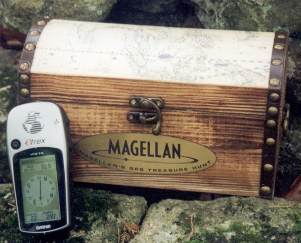 My GPS receiver in front of a 'commercial' geocache placement. Magellan came up with a neat public treasure hunt. This one was placed in Mastodon State Park in Missouri.