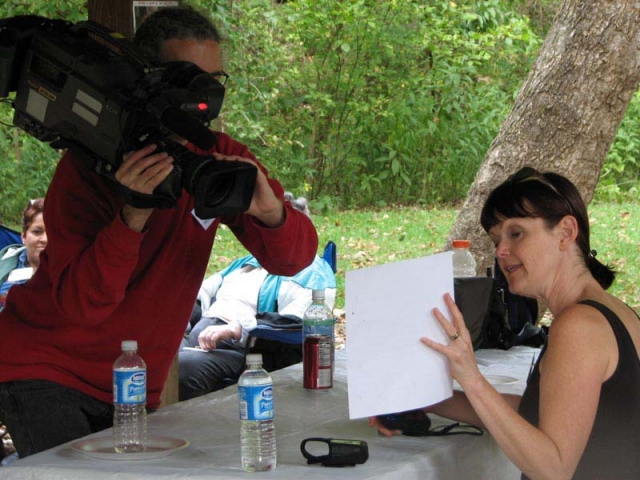 2006 - Missouri TV station showed up at a SLAGA picnic, looking for content. Geocacher, "rocksusan", is in front of the video camera.