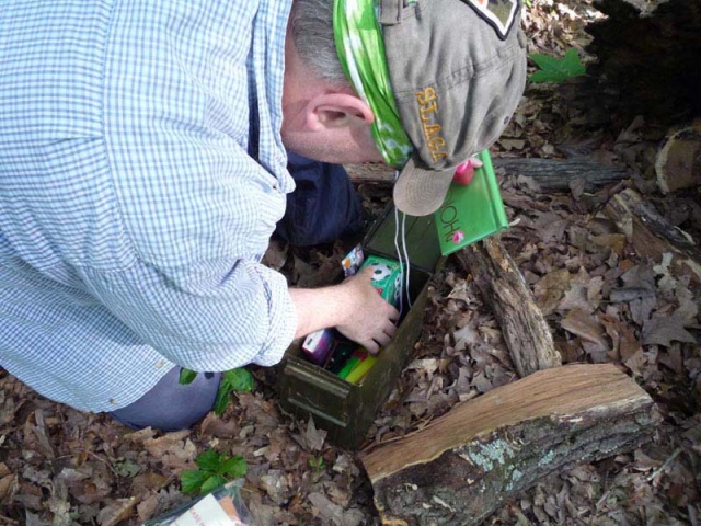 2008 - I am inspecting the trinkets in the Fanning Deer Crossing geocache near Cuba, Missouri.