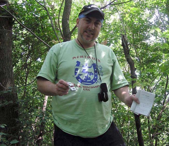 2004 - Holding a vintage Matchbox car trinket from the St. Croix Island geocache.