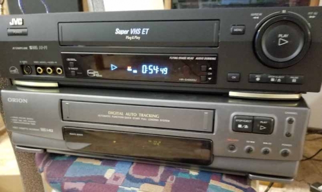 VCR players - $5 recycled unit on bottom; S-VHS on top