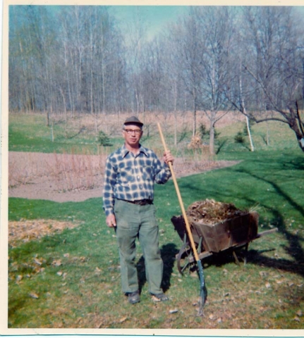 1980s - Working near garden in backyard - Luck, Wisconsin