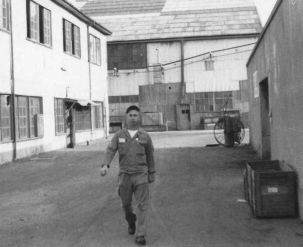 1955 - Walt in fatigues - walking with purpose