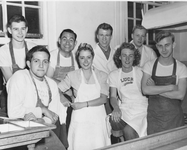 Pfeiffer Kitchen. Back: Bud Marshall, 'Bush' Kreger, Bob Weick, Dick Andersen. Front: Bill English, Nut Dupuis, Helga Koch (my mom), Elmer Havens.