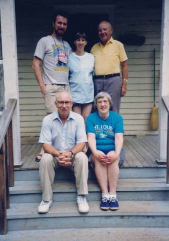 1990 - Bill and Barb Schrammen, Ove Neilsen.  Walt and Helga Konopacki sitting.  Steps of house in Luck, Wisconsin.