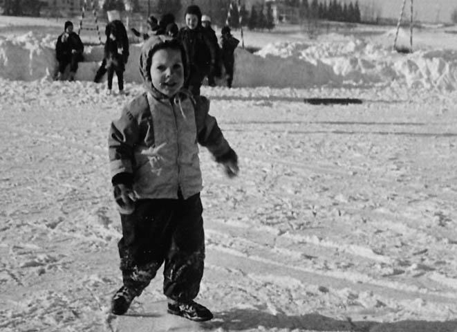 1965. Skating on community rink on AFB housing in Duluth, Minnesota.