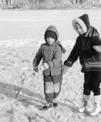 Late 1960s. Paul and Barb skating on frozen Little Butternut Lake.