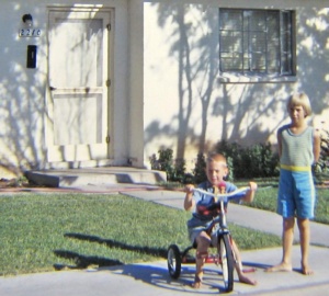 1967 - Paul (on tricycle) and Barb outside 2210 Albro in Tucson, Arizona