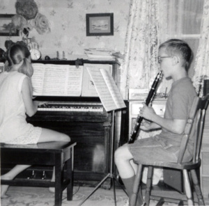 Mid 1970s. Sister at piano. Me with clarinet. Piano still sits in that location.