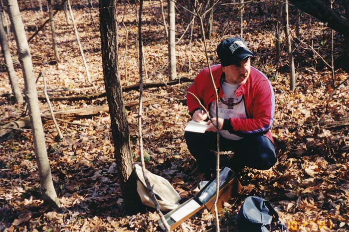 Writing an intro in the logbook of my first geocaching placement
