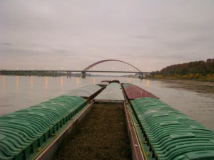 View of tow from pilothouse. Heading south on Mississippi River. Jefferson Barracks bridge in distance.