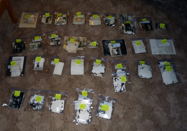 Printed photographs in ziplock bags.