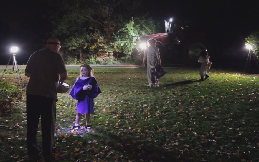Handing out candy on Sunrise Drive. I set up portable LED lights on the lawn so the kids don't trip.