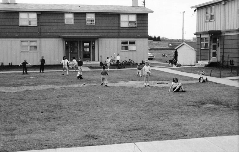 1965 - Inner courtyard on base housing in Duluth, Minnesota. Mom said I used to ride my tricycle on two wheels around the corners.