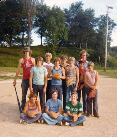 1976 Little Butternut 4-H softball team. Standing: Paul Petersen, Steve Jensen, Tony Jensen, Paul Konopacki, Randy Larsen, David Clifton, Mike Martinsen, Ron Petersen, Alan Jensen. Sitting: Gretchen Nies, Danette Morten, Barb Konopacki