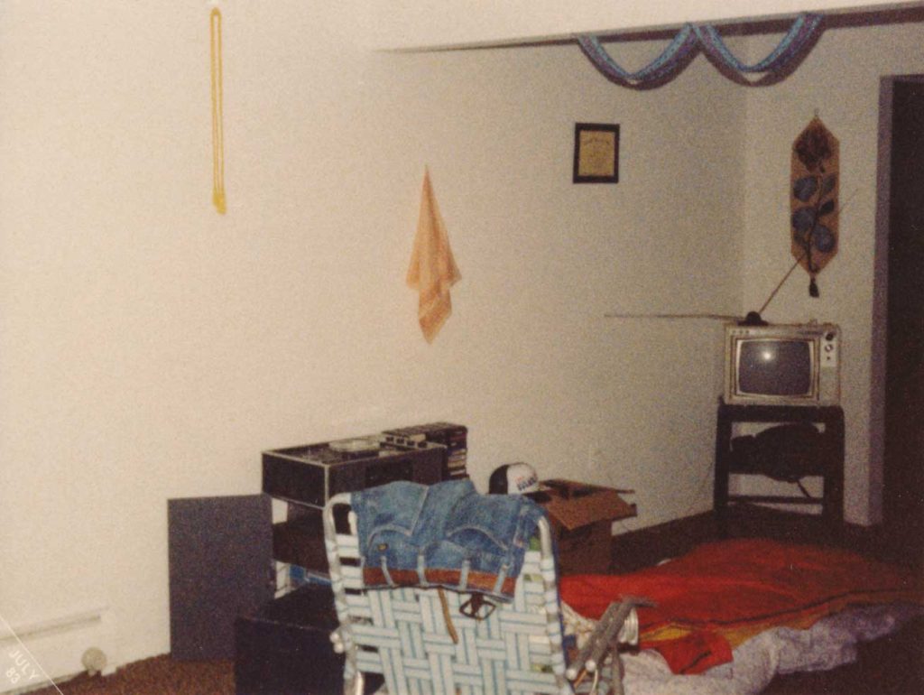 Apartment living space. Sleeping bag on air mattress. Lawn chair is my only chair. Dad's old foot locker is my coffee table. Reel-to-Reel and 8-track tapes against the wall is my entertainment center.