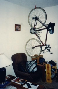 Hanging bike in living room. Omni Vega 14-speed, road bike for $275.