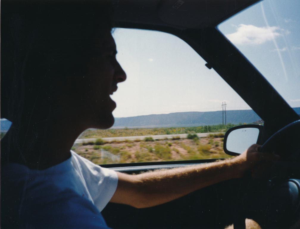 Joe driving and singing to a heavy metal song