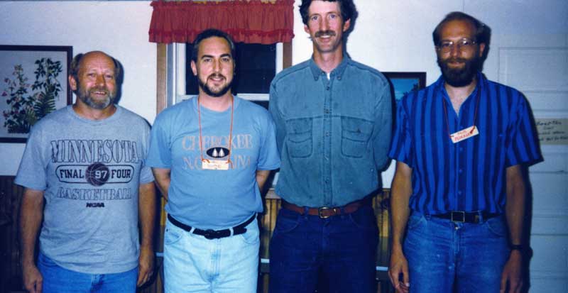 Four of the Five 'Pauls'. Pastor Paul (Andersen), Fast Paul (me), Tall Paul (Petersen), Small Paul (Pedersen). Missing is Crazy Paul (Hansen). Standing in the West Denmark Hall basement at the annual 1997 West Denmark Family Camp.